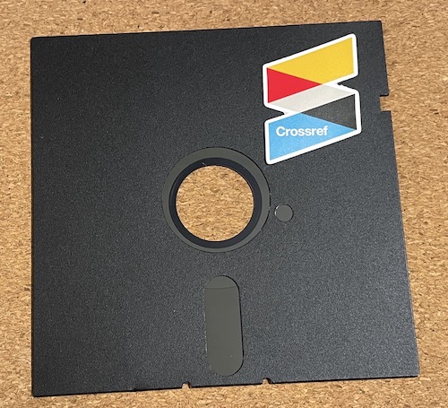 5¼ inch floppy disk with Crossref logo